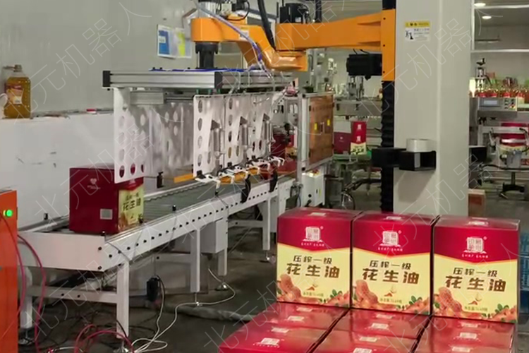 花生油自動(dòng)碼垛機(jī)，箱裝物料堆垛